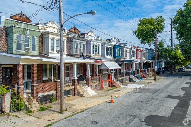 Itallianette style row homes in Allegheny West come with covered front porches.