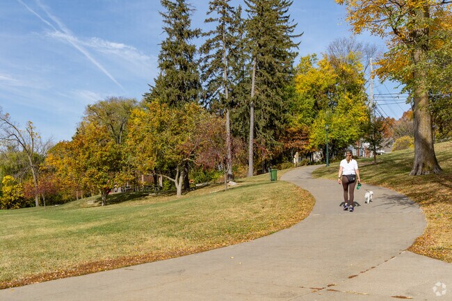 Melrose residents enjoy relaxing strolls through the shaded paths of Brookland Park.