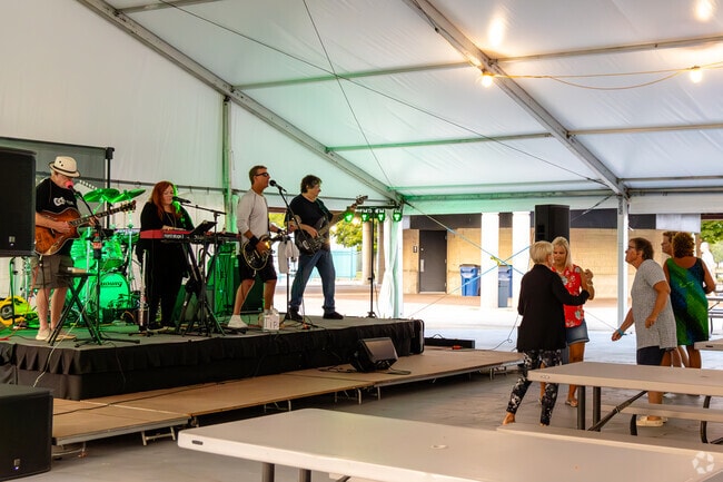 A group of Racine residents dance and enjoy the live entertainment at Hot Harbor Nights.