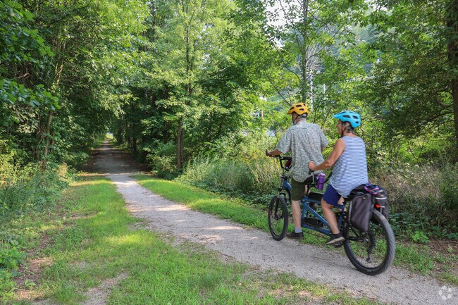 Webster cyclist use the Northern Rail Trail for scenic afternoons.
