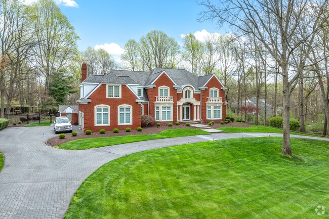 Enjoy living in Harper's Choice with a great front yard.