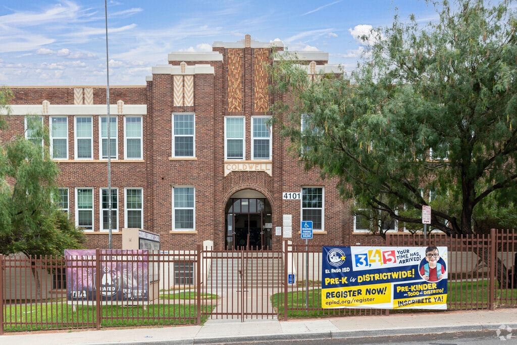 Coldwell Elementary School welcomes its students through a gated entrance in Five Points.