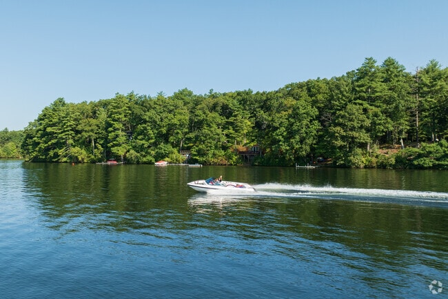 Webster Lake brings summer fun to Memorial Beach Park with water and sun.