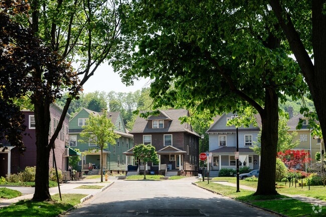 Many of the residential streets in Upper Monroe have sidewalks shaded by trees.