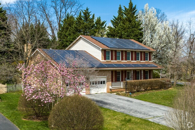 Modernized Colonial Revival located in the heart of Clover Hill.