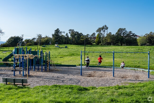 Fairmede-Hilltop children play at Hill Top Park.