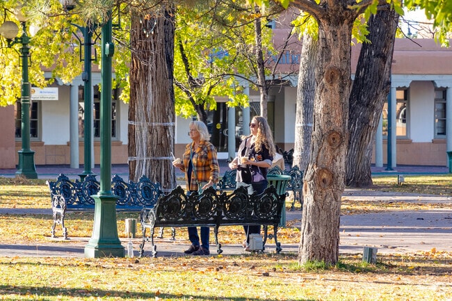 A mother and daughter enjoy ice cream on the Plaza Near La Nueva Casa Solana.
