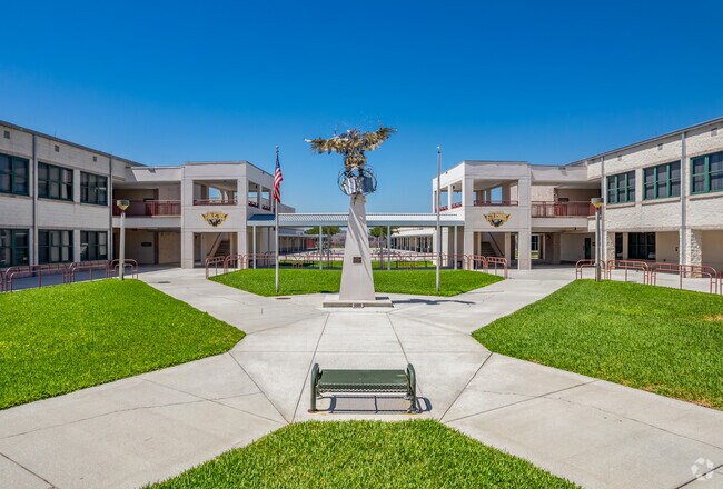 A statute of Bay point middle school's mascot stands tall at the entrance to the school.