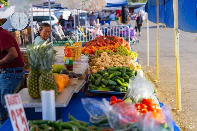 Fresh fruits and vegetables are arranged for sale at the Madera Flea Market in North Madera.