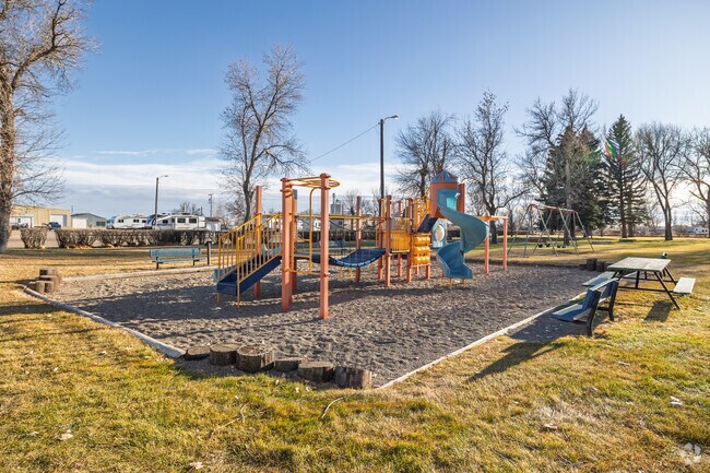The colorful playground welcomes families at Legion Park in Conrad.