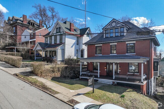 Some streets in Fineview have houses situated on a hill.