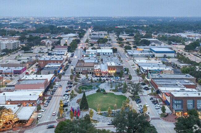 The Downtown Garland area of Garland is lit up at night with Holiday lights.