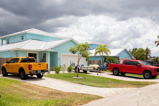 Colorful homes with colorful cars are great match in the streets of Golden Gate Neighborhood