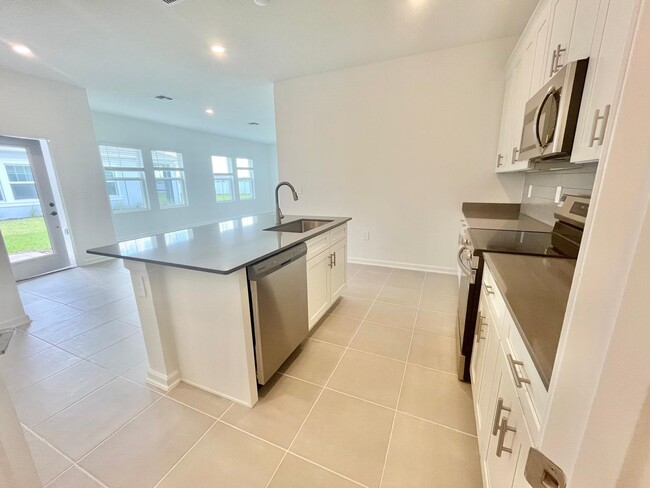 4309 Curacao Place, Poinciana, FL 34758 - photo 7