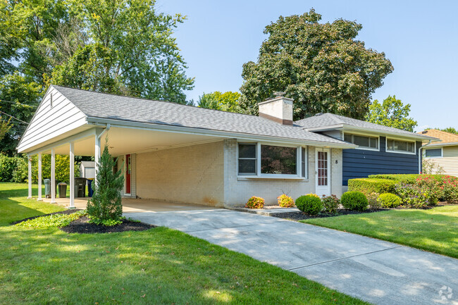 Split level homes in Lower Allen often have attached garages or car ports for parking.