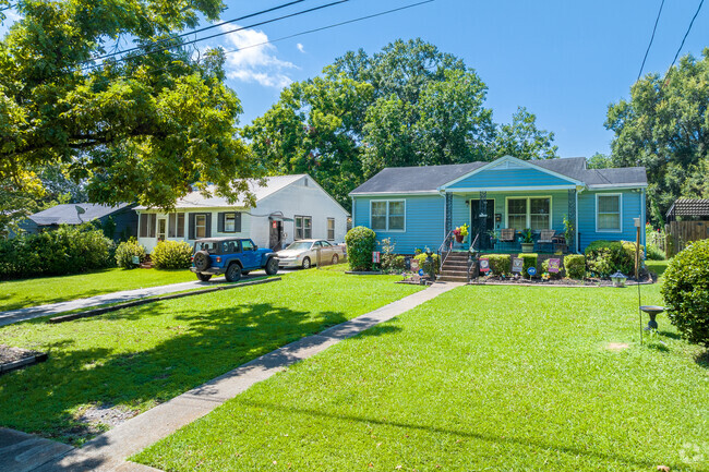 Colorful bungalows brighten the close knit community of West End.