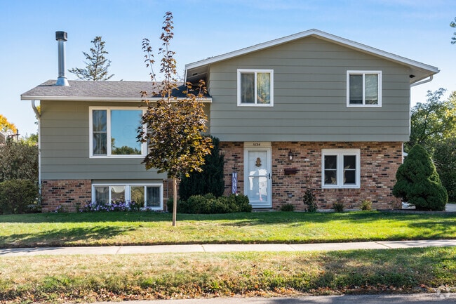 Split-level homes in Meadow Park offer a spacious, suburban feel with classic brick accents.