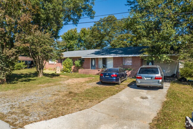Homes in Browns Bridge sit back on wooded lots with tall shade trees.
