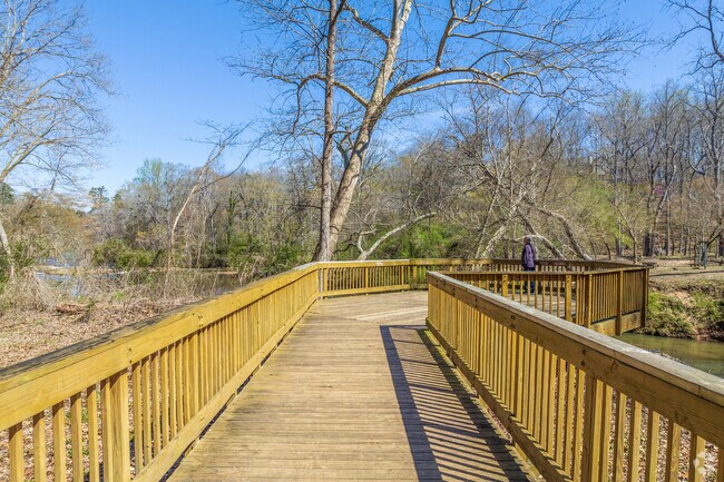 Yellow River Park walkway leads to fishing spots nearby.