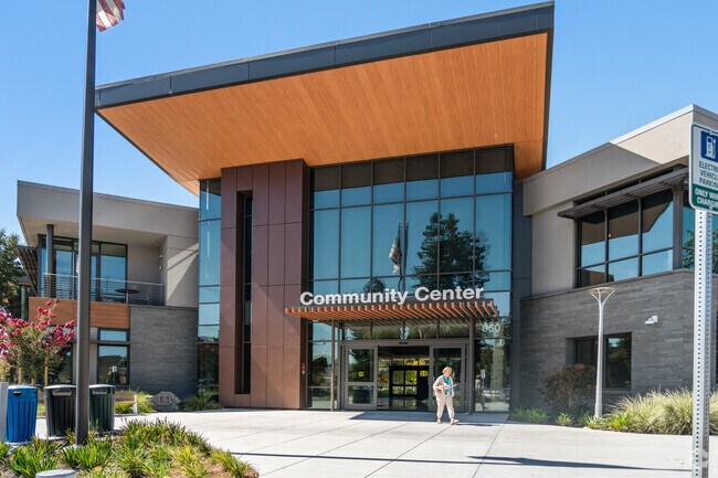 The modern community center in Oak Grove Manor hosts activities for all in a sleek facility.