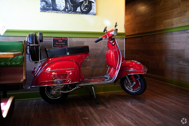 You can see a scooter parked in Francesca's Italian Restaurant in Galeville, NY.