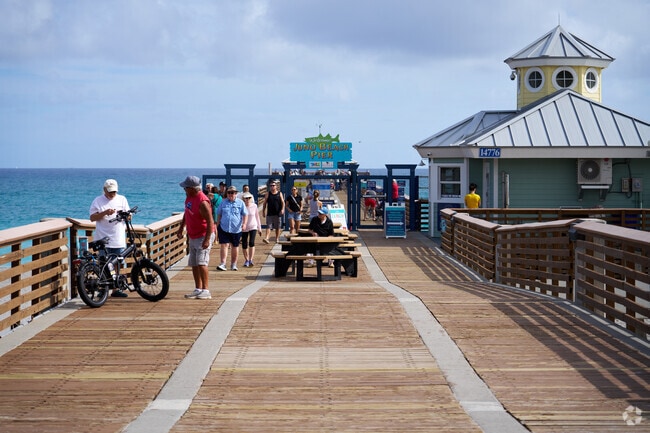 The Juno Beach Pier is a popular destination for fishing and watching the waves.