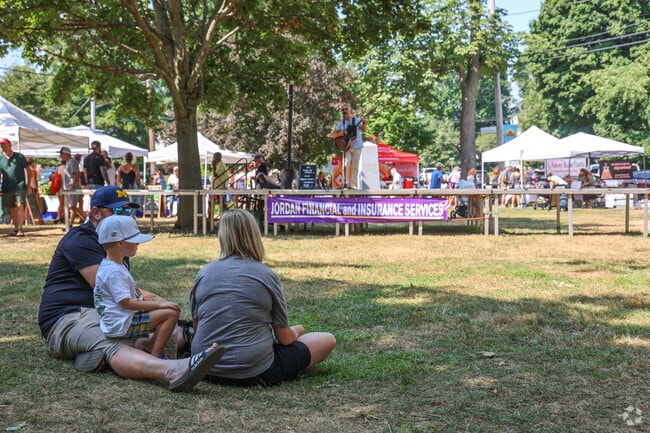 Families enjoy the live music together at the Haverhill Farmers Market.