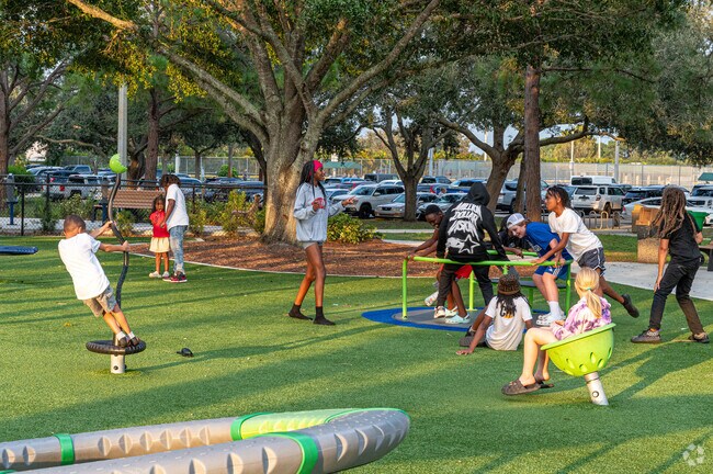 Whispering Pines Park has fantastic playgrounds and sports courts near Southbend Lakes.