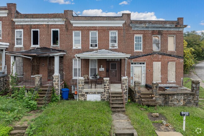 Much of Franklintown Rd. is in disrepair, with many homes sitting between condemned units.