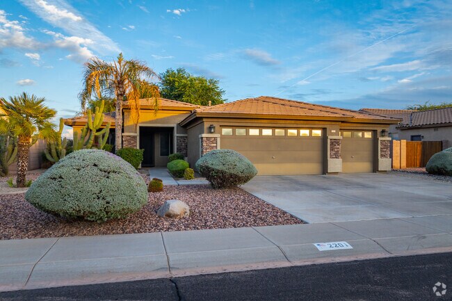 Gateway Ranch homes are adorned with ornate shrubs, adding a touch of green elegance.