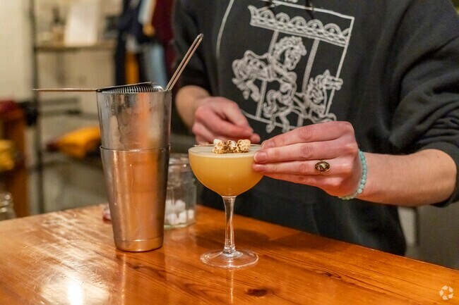 Craft cocktails flow at Ann Arbor Distilling Company near Water Hill.