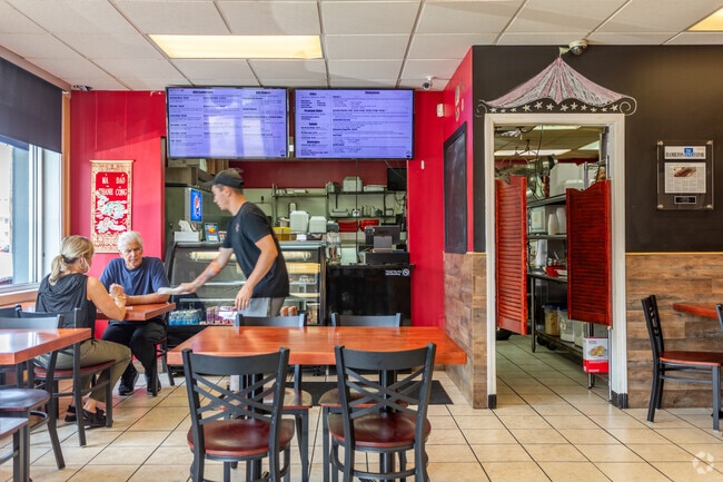 Residents of Bassett Park fill their bellies with pork, brisket, ribs and salmon at Capital City BBQ.