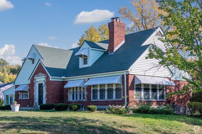 Large mature homes line Meyer Boulevard located within the Swope Park Campus neighborhood.