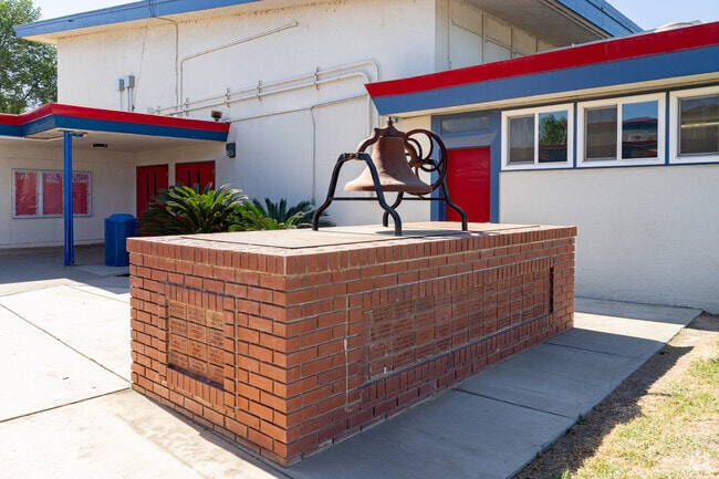 An antique school bell is featured at the entrance of Kit Carson Elementary School in Hanford.