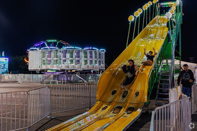 Kids slide into fun at East Meadow Chamber of Commerce Fall Fair.