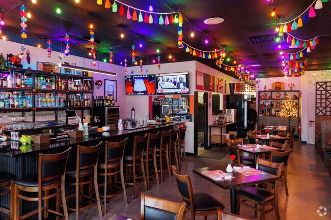 After a long day, Café De Martin is the place to go for a drink and Latin music.