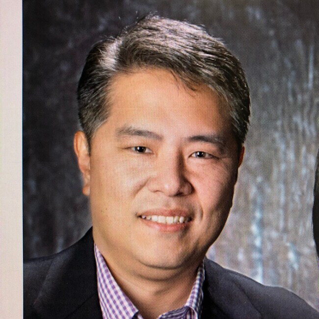 TOM KIM