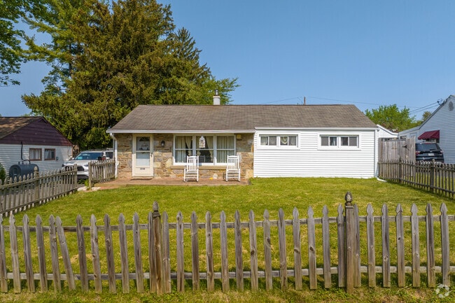Ranch-style homes in Abington can feature picket fences for safe playtime in the yard for kids.