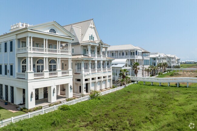 Grand Beach homes often have boardwalks over the sand dunes, leading to the beach.
