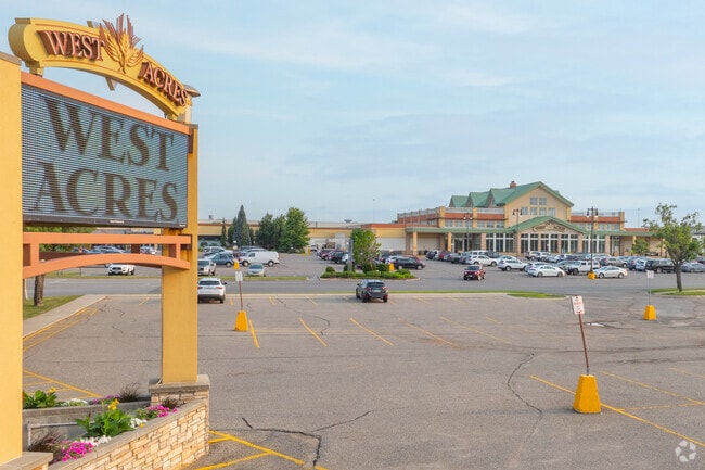 There are various shopping centers, restaurants, and cafes nearby, like West Acres.