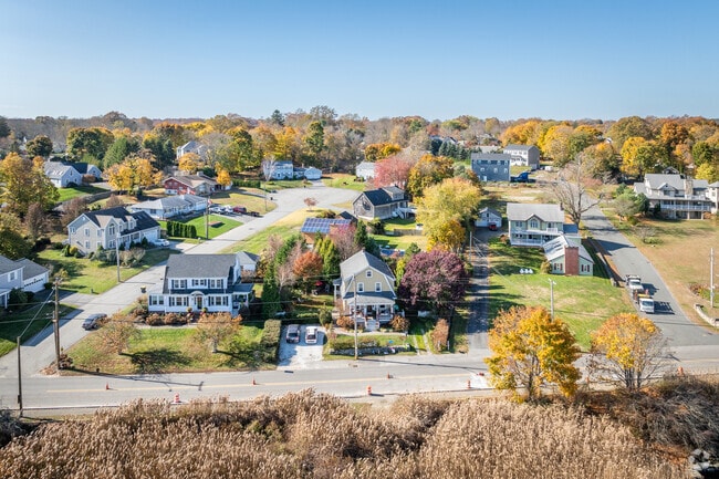 A bird's-eye view of Somerset Historic Village, where homes are nestled in nature.