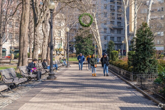 Rittenhouse Square Park is where residents come to enjoy the sun on a winter day.