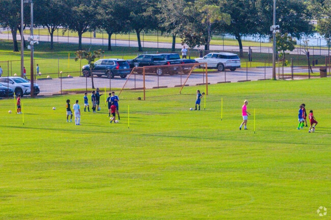 Children play soccer at McChesney Park in St Lucie West.