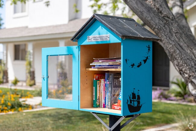 Find one of the many Little Free Libraries on a walk around Rancho de Arboleda.