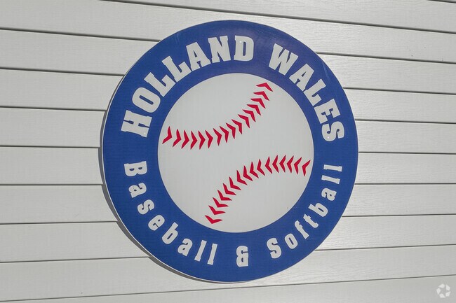 Watch the local holland wales play baseball at Hichcock Park in in Holland.