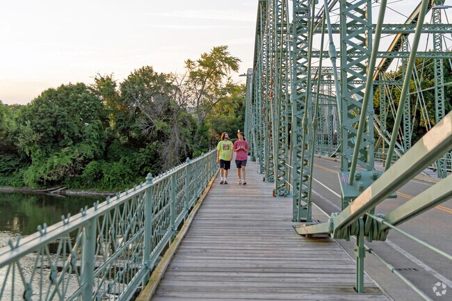 Local residents enjoying a walk across the Susquehanns River in the West Side community.