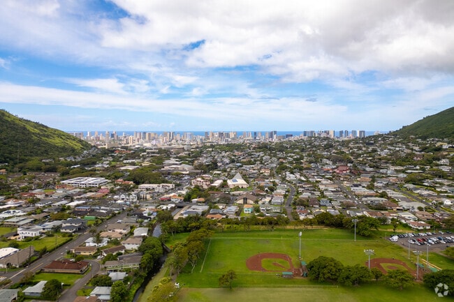 Living in Manoa offers a harmonious balance between suburban tranquility and urban convenience.