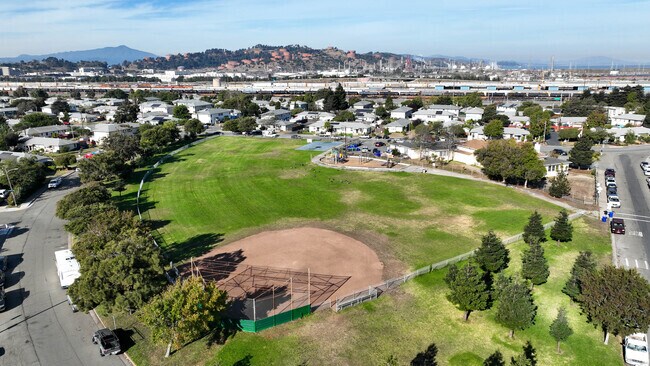 Santa Fe offers residential charm with Atchison Village Park at its center.