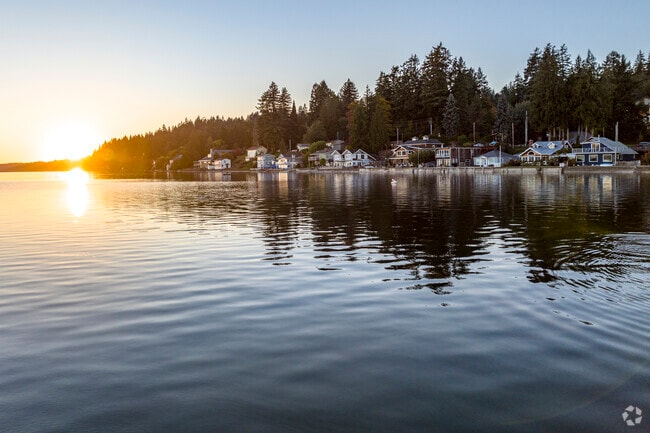 The sun sets on the coast of Wauna.