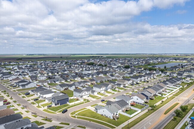 Live in Eaglewood, where new homes perfectly blend comfort and nature.